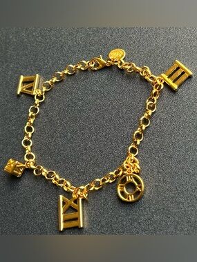 Gold plated Charm Bracelet with Roman Numeral Pendants